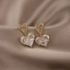 Mystic White Heart Earrings